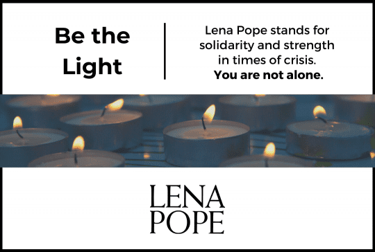 A poster with candles and the words " be the light ".