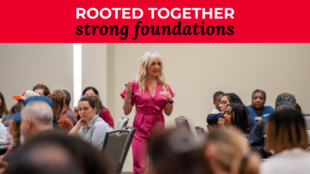 Engaging speaker at Rooted Together event.